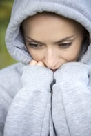 Young woman on a cold morning in a hooded top before going out for a run-2