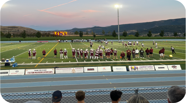 Footballspiel bei Sonnenuntergang
