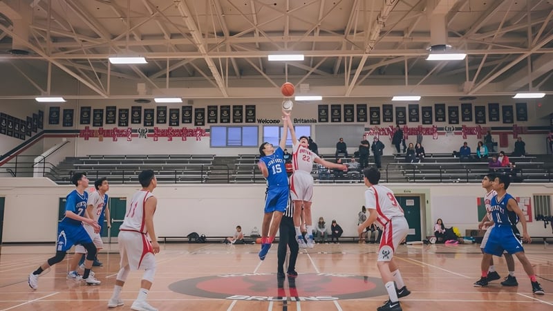Schüler der City Vancouver Academy High School spielen ein Basketballspiel vor Zuschauern in den Tribünen.
