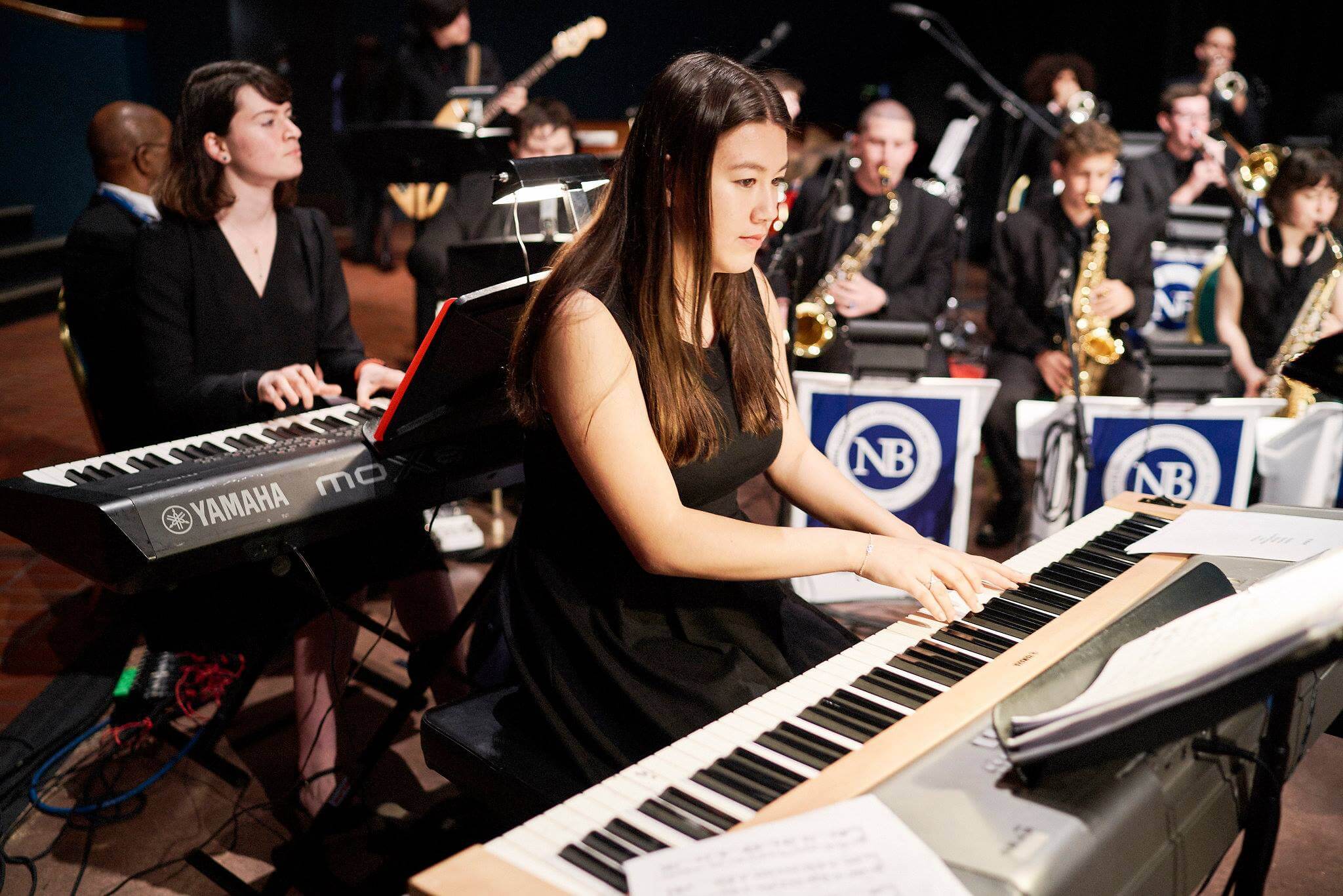 Eine Gruppe von Schüler:innen beim Orchester