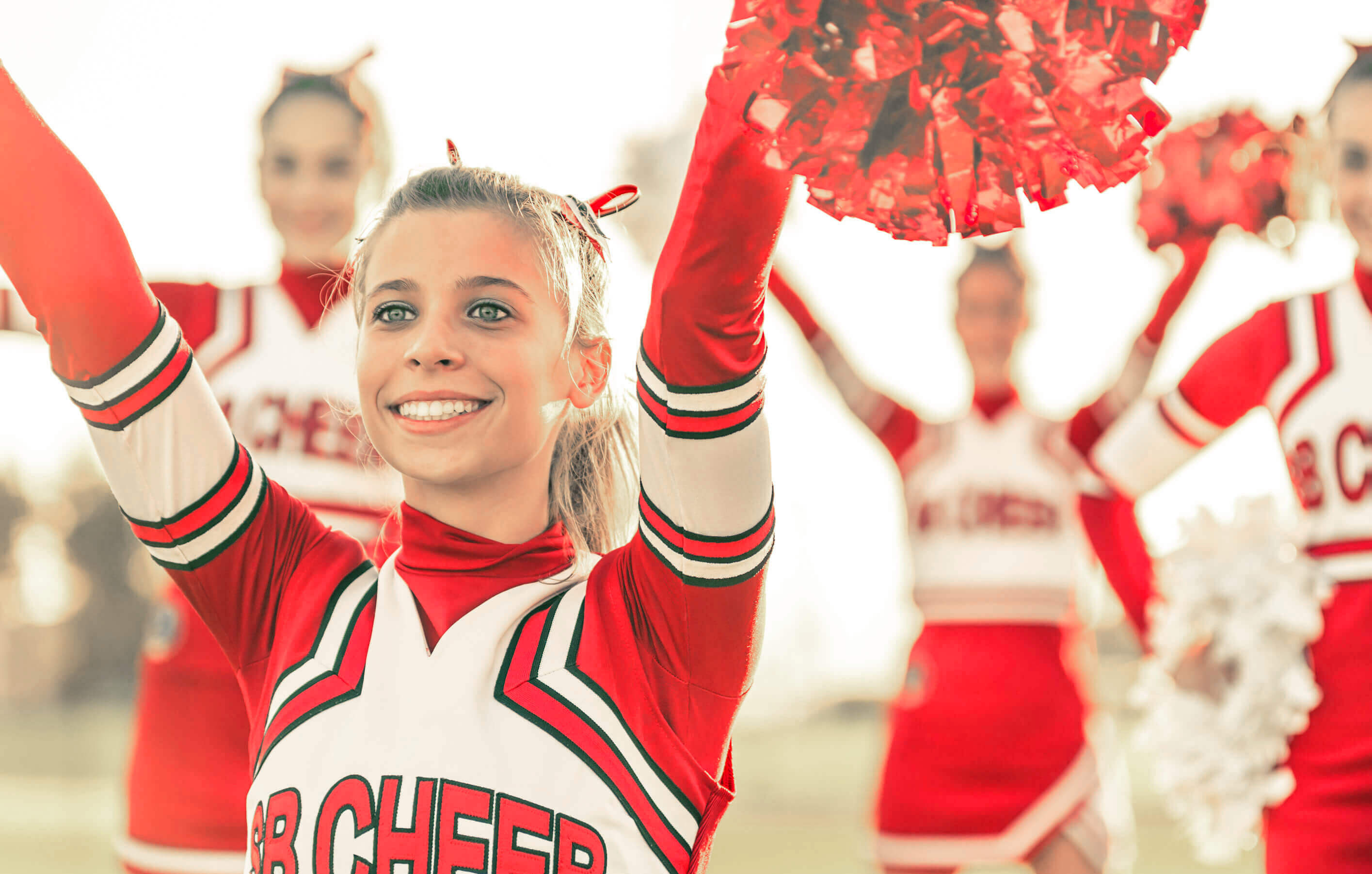 Cheerleaderin während des Trainings